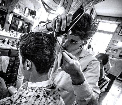 barber cutting a man's hair